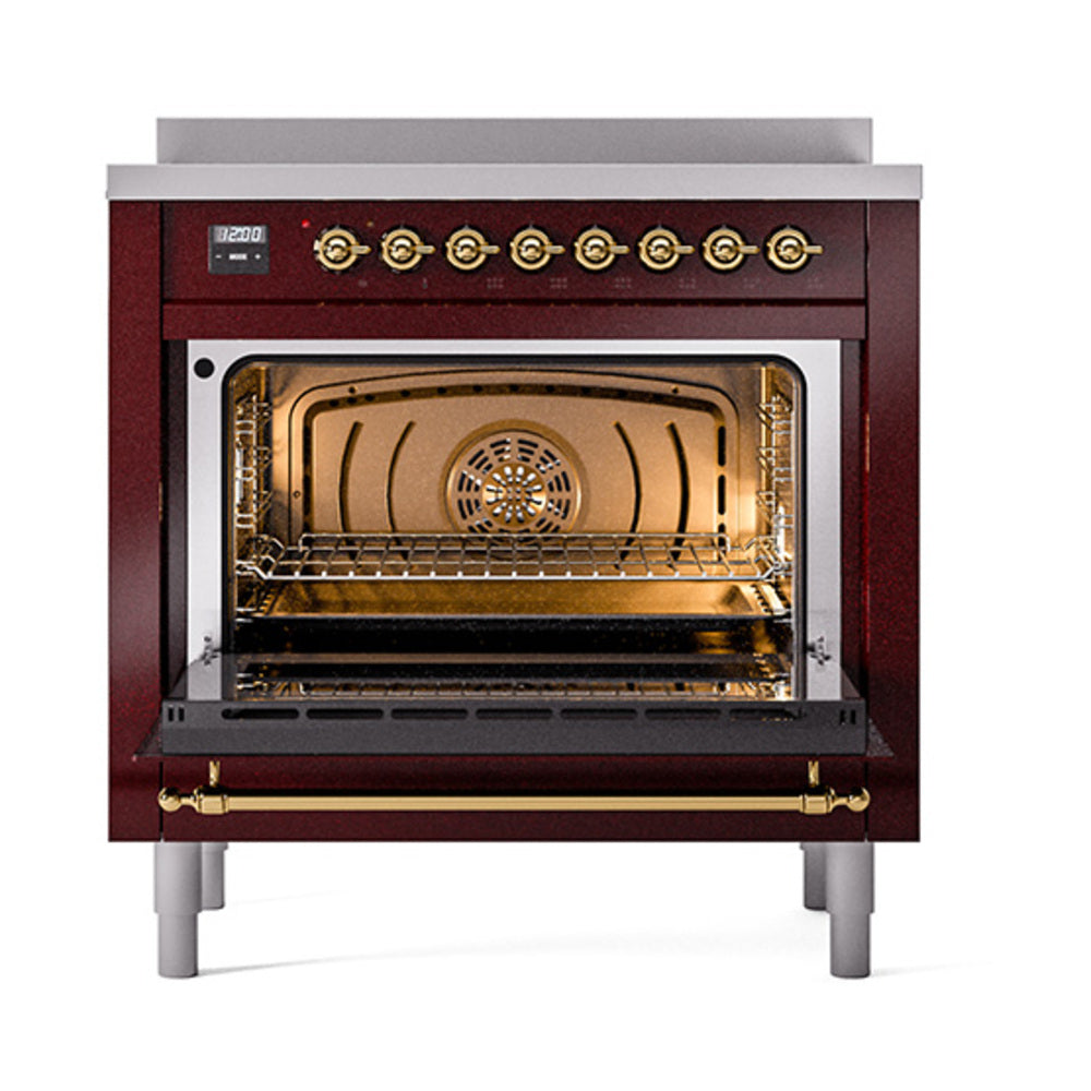 Burgundy induction range with open solid door oven and brass-trim interior racks
