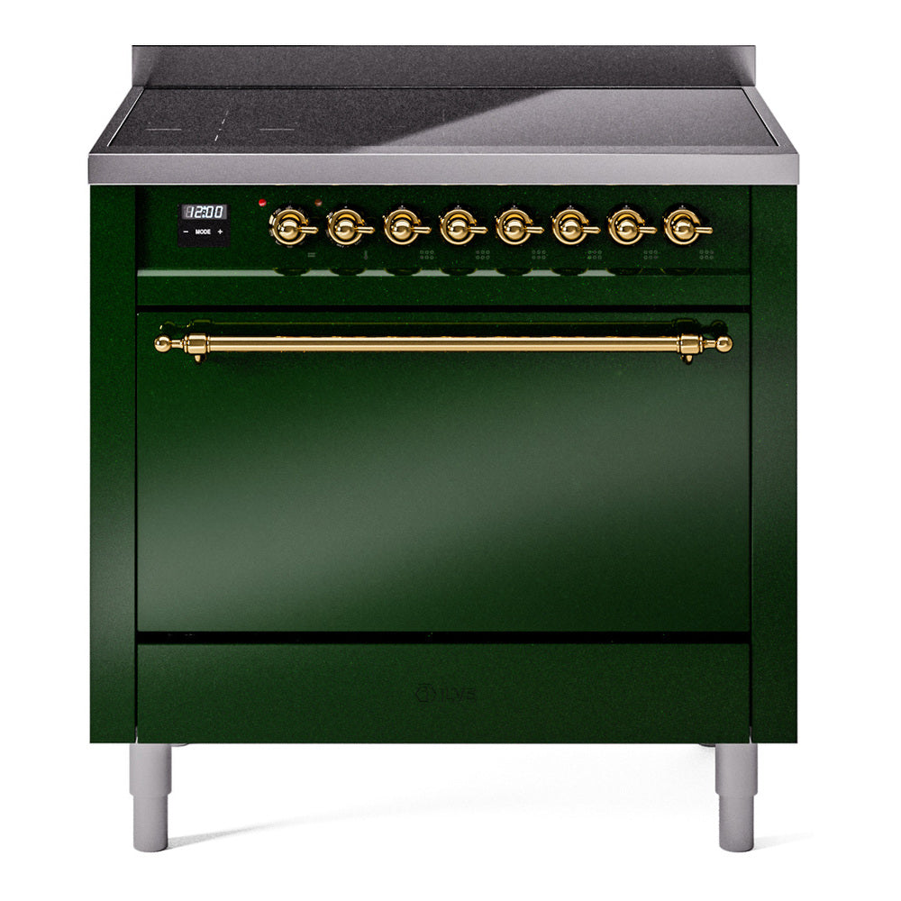 Emerald green induction range with brass control knobs and oven handle