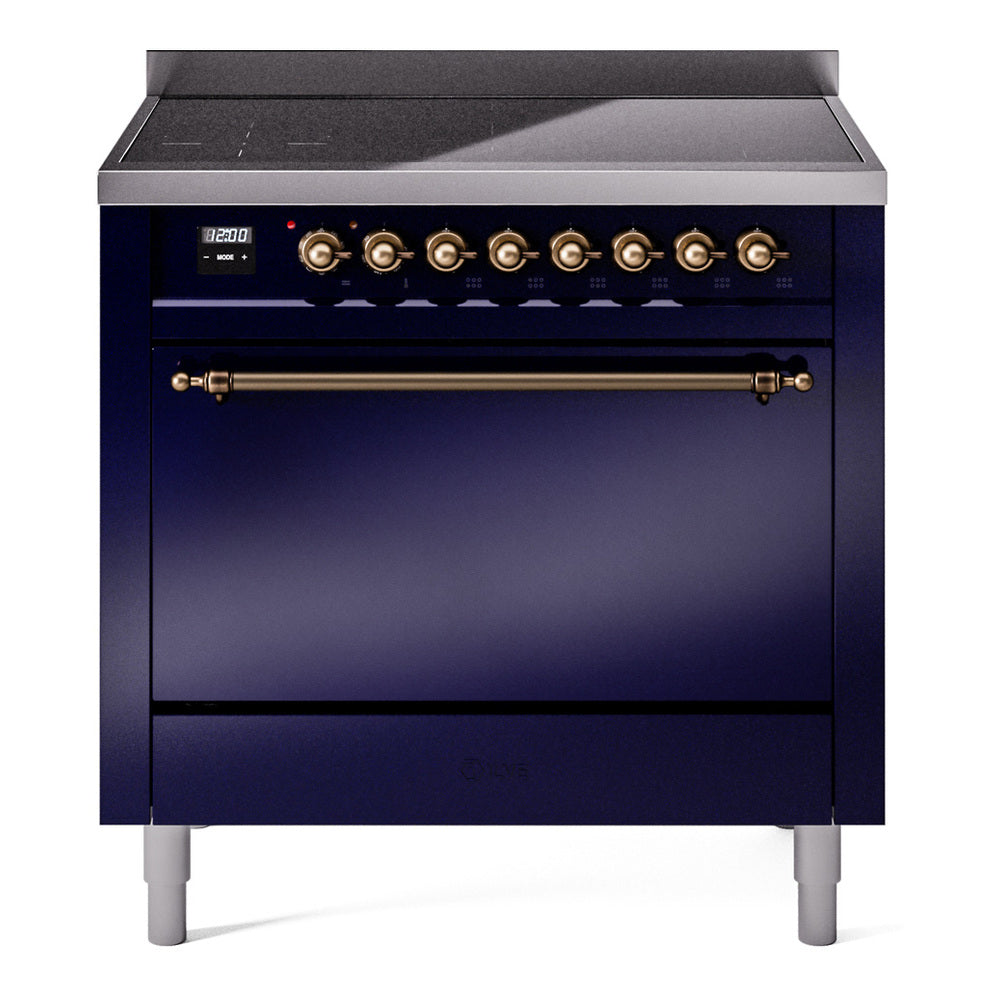 Midnight blue induction range front with bronze knobs and oven door