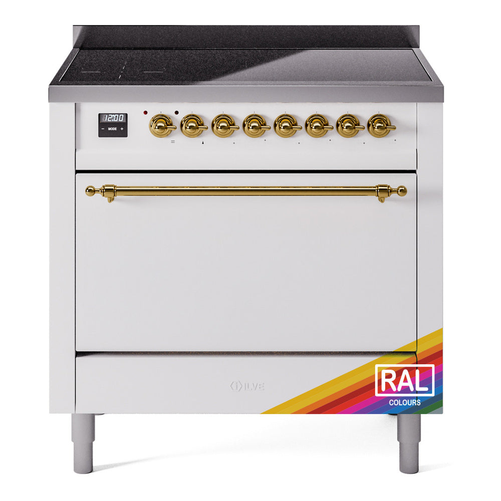 ILVE Nostalgie induction range front with brass handle trim, black cooktop cover, white body