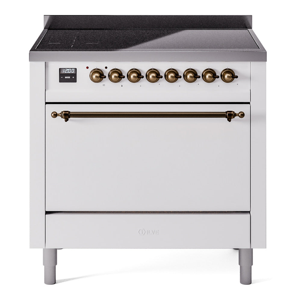 White induction range with bronze control knobs, top burners, and closed oven door