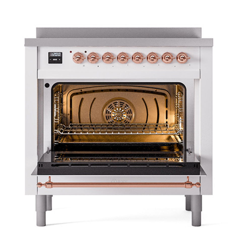 White ILVE induction range oven door open, showing interior racks and copper accents