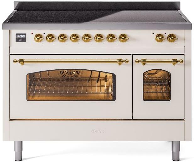 Antique white electric induction range with brass trim, open oven door and knob controls