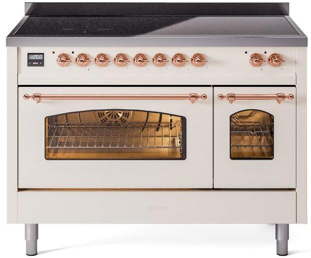 Antique white electric induction range with copper trim, two ovens, control knobs