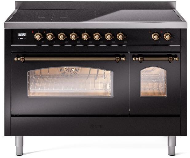 Glossy black induction range with bronze trim, dual oven doors and control knobs