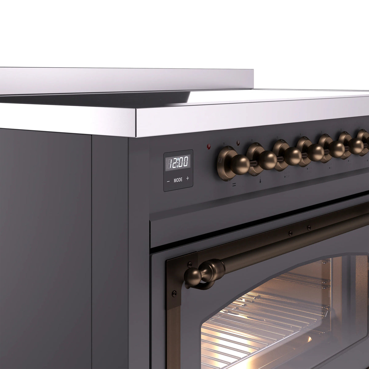 Induction range control panel close-up with digital clock, bronze knobs, matte graphite