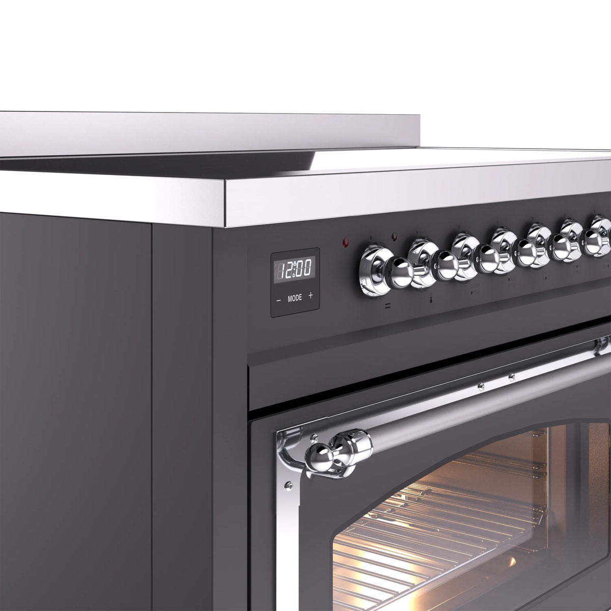 Matte graphite induction range control knobs with digital clock display and chrome handle.