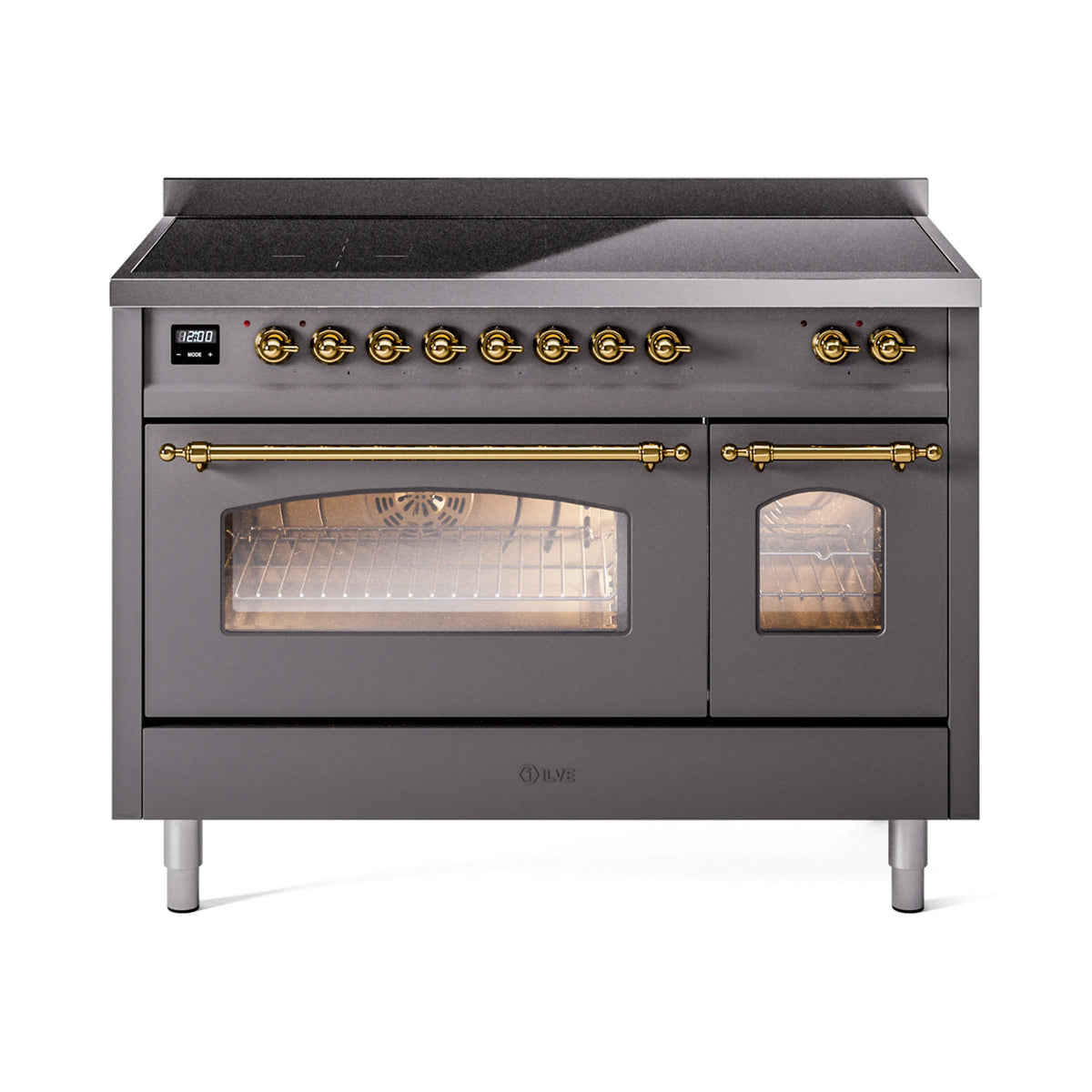 Matte graphite induction range with brass-trim dual oven doors and viewing windows