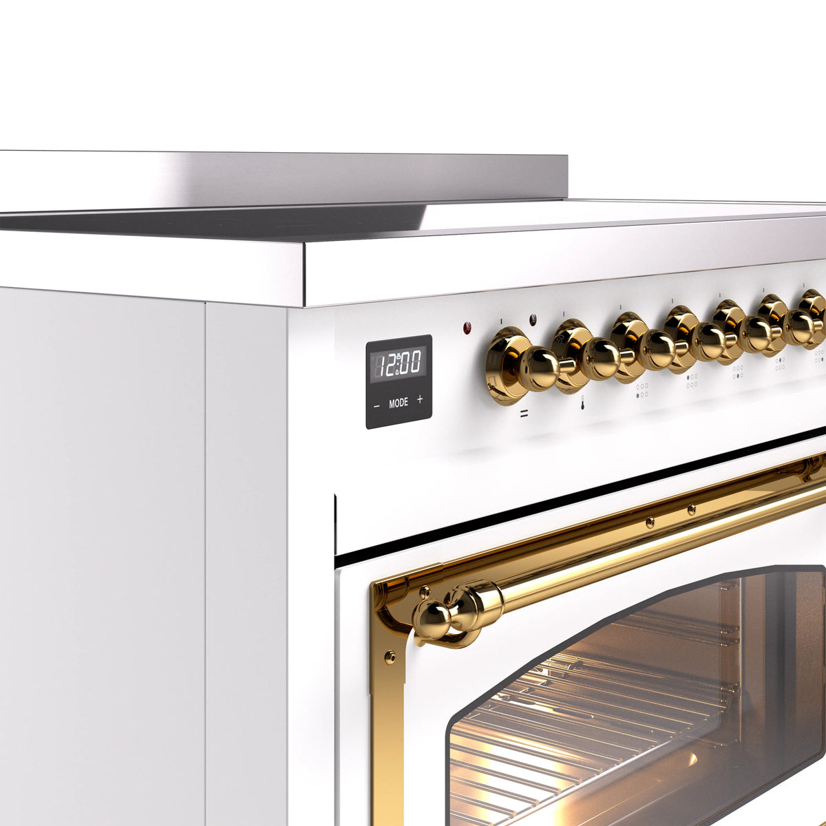 White induction range control knobs and digital display with brass accents