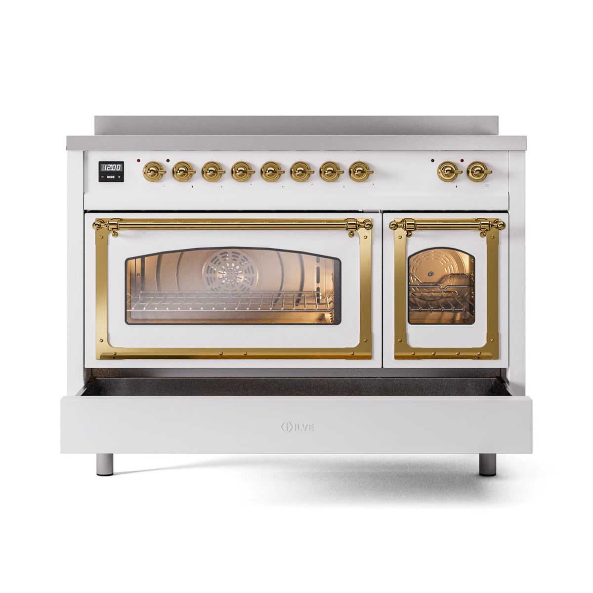 White induction range with brass-framed glass oven doors and stovetop controls
