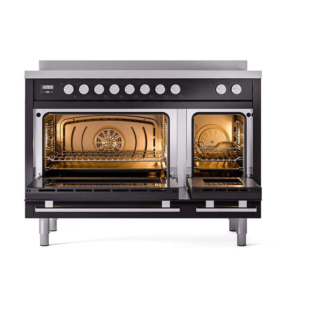 Glossy black dual oven with both doors open, interior light, racks visible