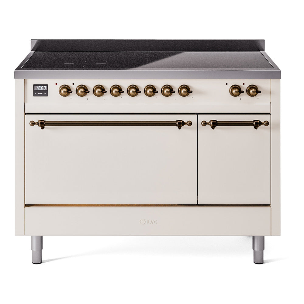 Antique white induction range with black cooktop, bronze knobs, and double oven doors
