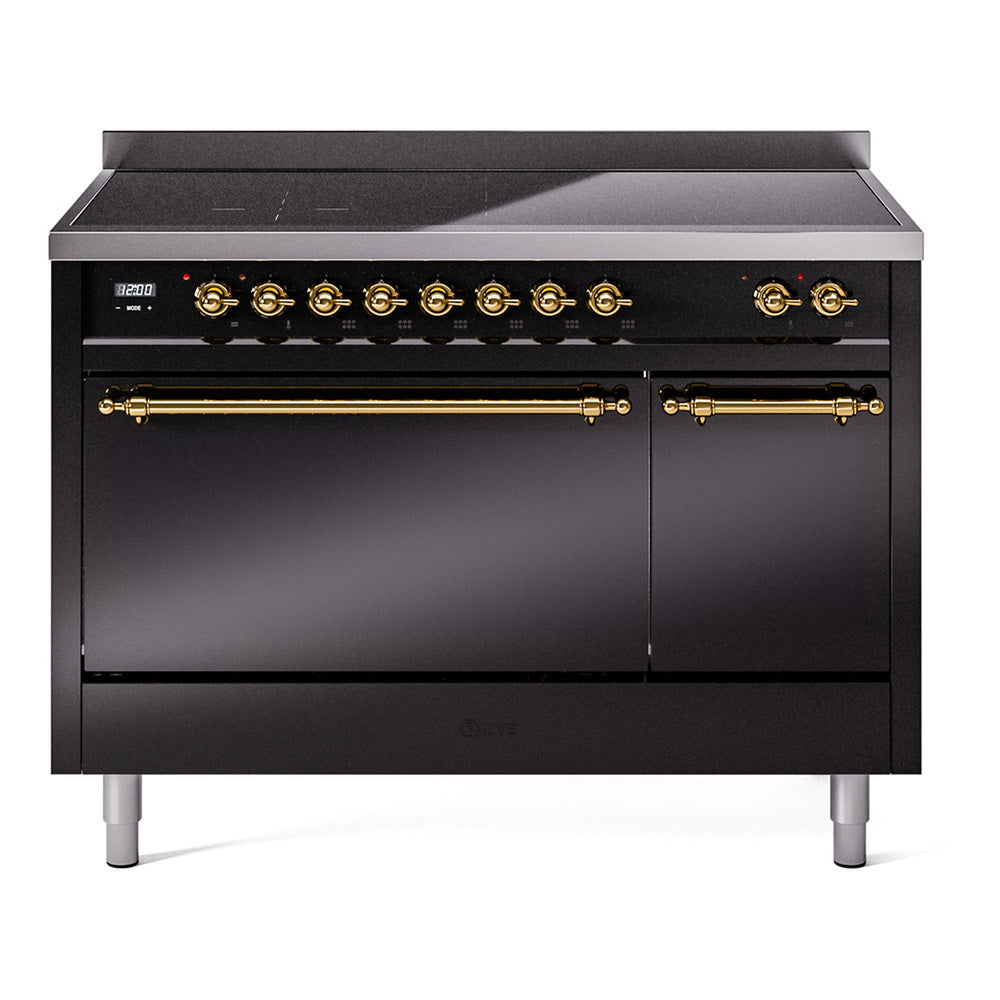 Black induction range with cooktop, brass knobs, and closed double oven doors