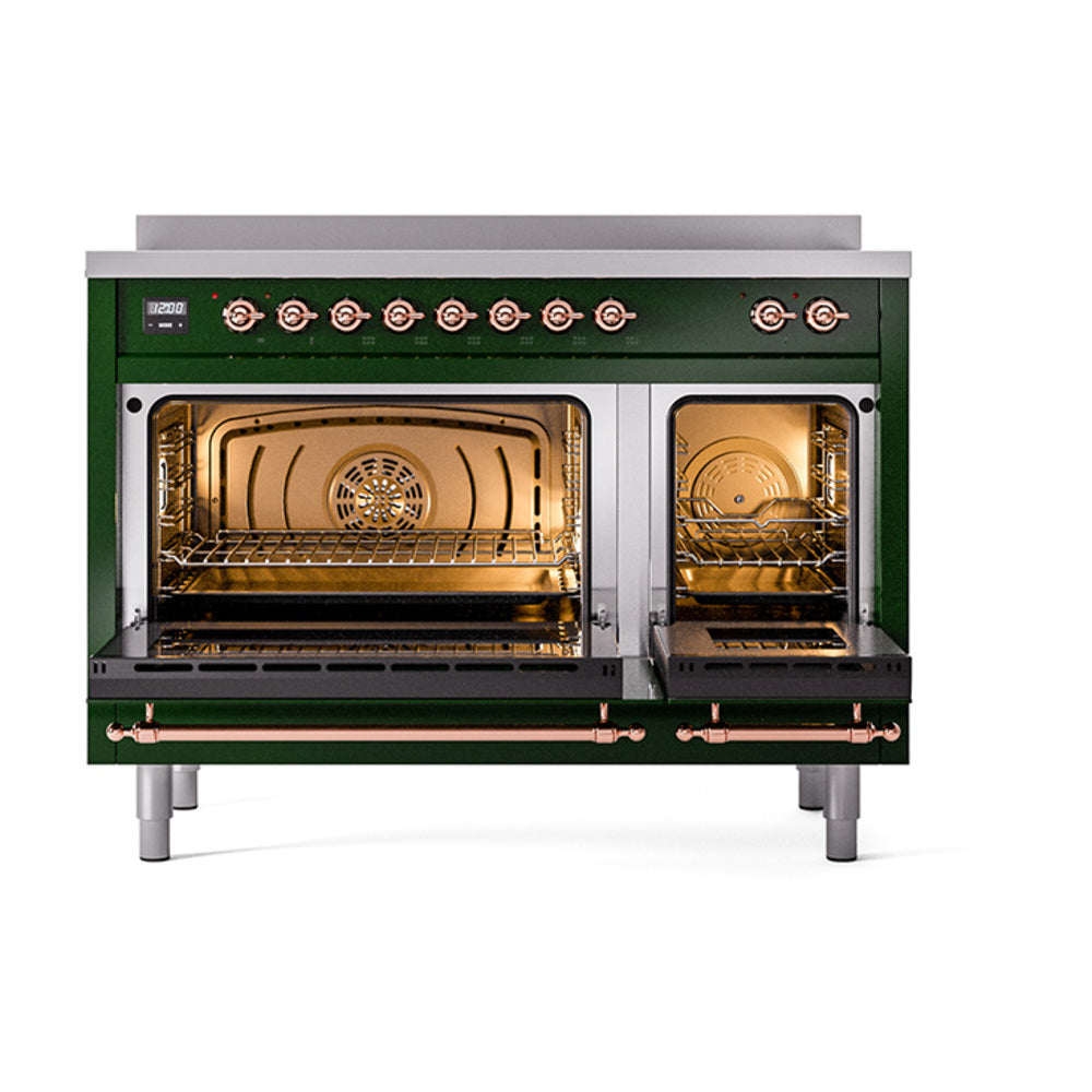 Emerald green induction range with open dual oven doors and copper-trim control knobs