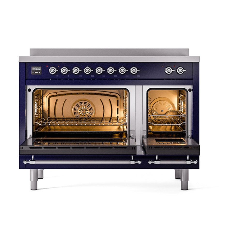 Midnight blue range with two open ovens showing interior racks and lighting