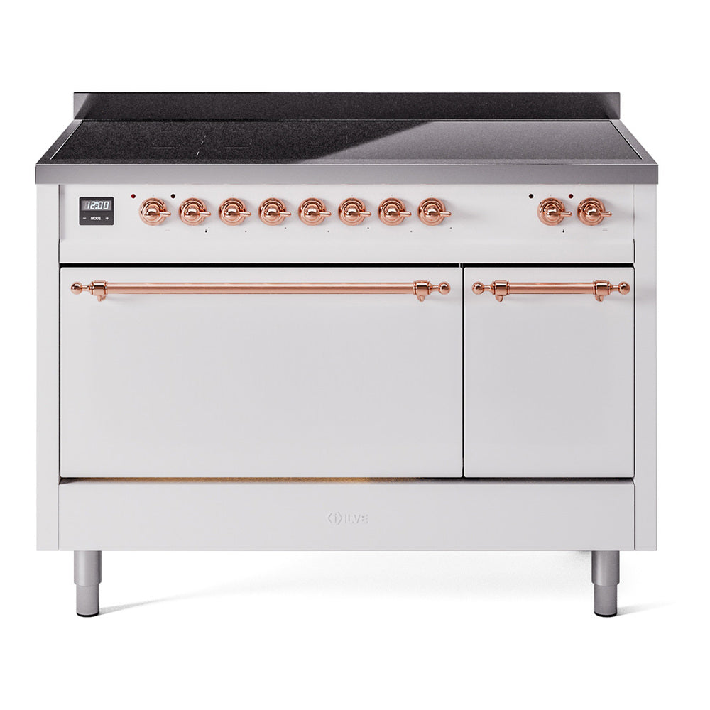 Stainless and white induction range with copper knobs and black cooktop over two closed doors