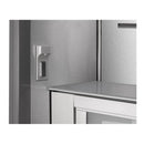Stainless steel refrigerator interior with dispenser lever and lower shelf bin