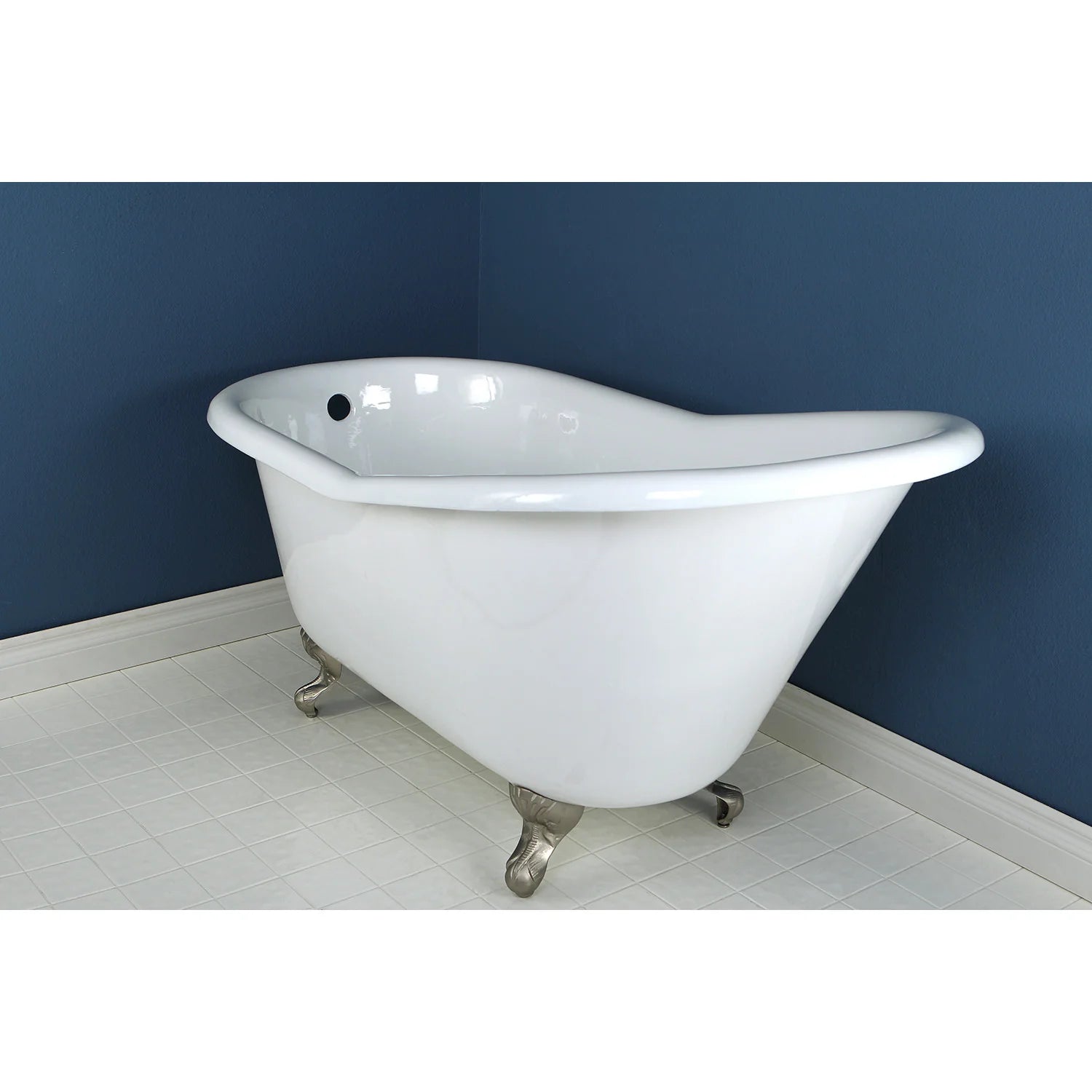 White oval slipper clawfoot cast iron tub with metal feet, no faucet installed