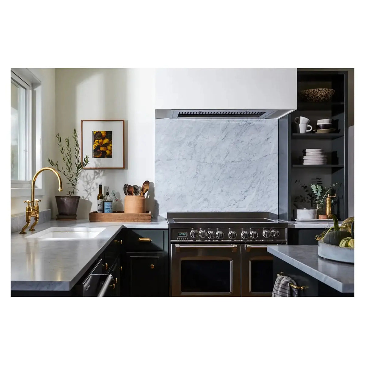Stainless electric range with double ovens and under-cabinet range hood