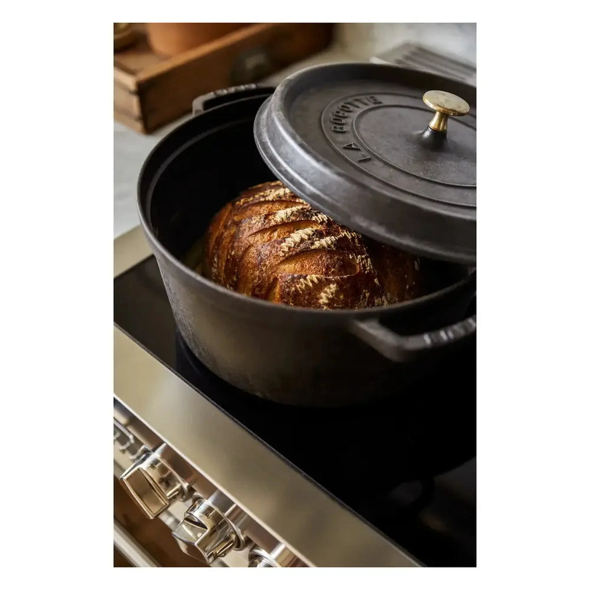 Lidded Dutch oven heating inside the electric range oven cavity
