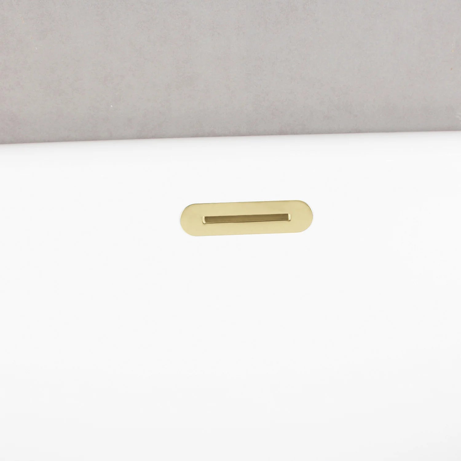 Polished brass rectangular overflow cover for acrylic freestanding tub