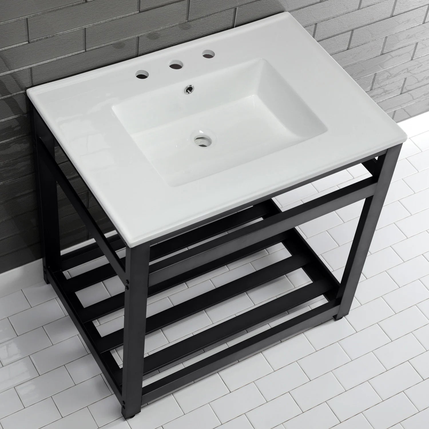White ceramic console sink with centered drain and 3 faucet holes on black frame