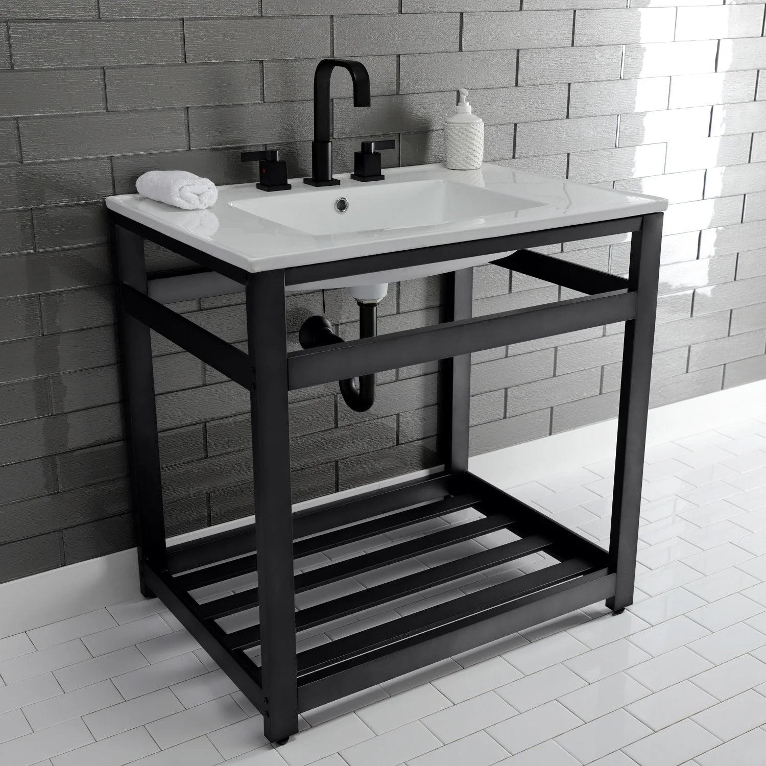 White ceramic sink with matte black faucet atop matte black steel console stand