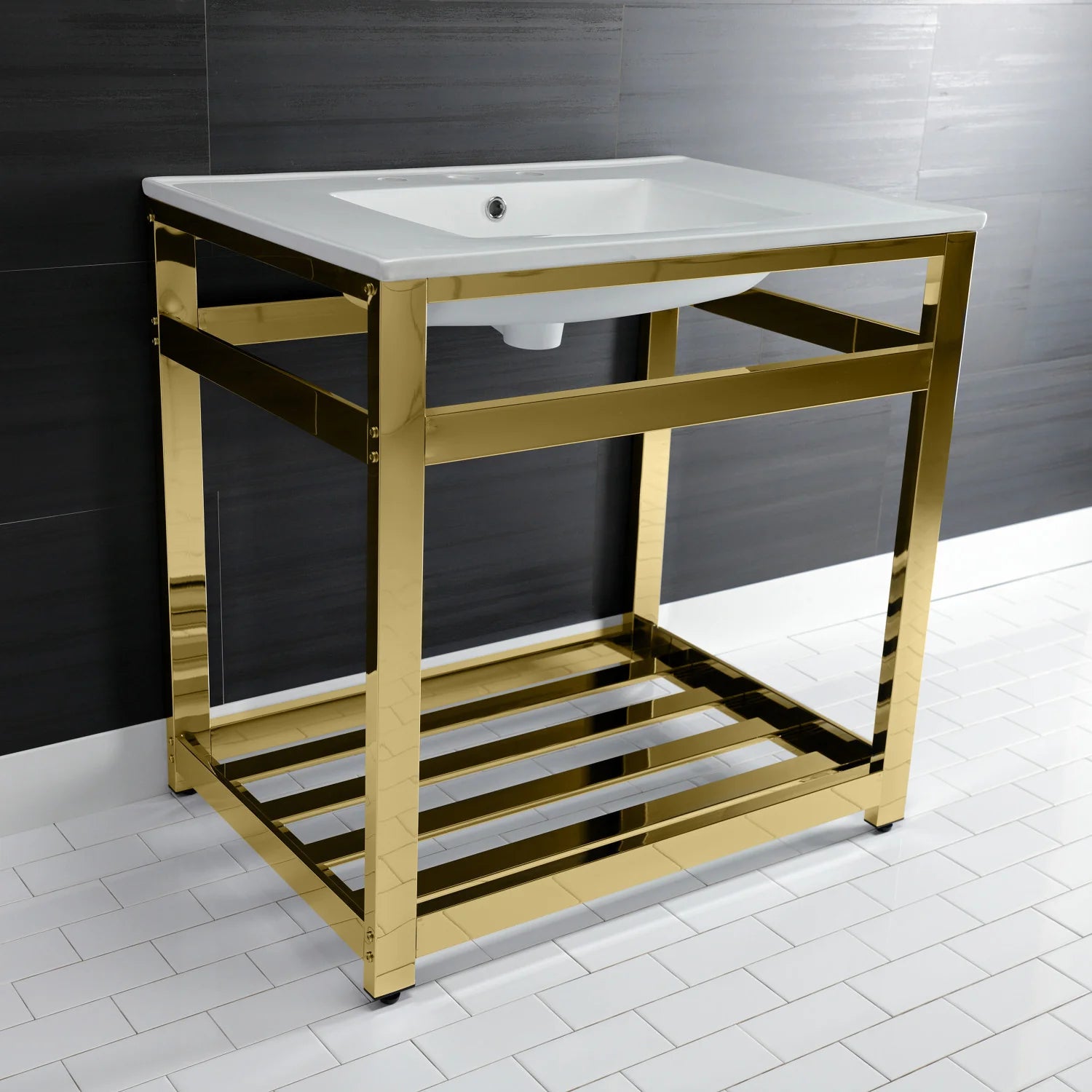 White ceramic console sink with polished brass frame and open lower storage shelf