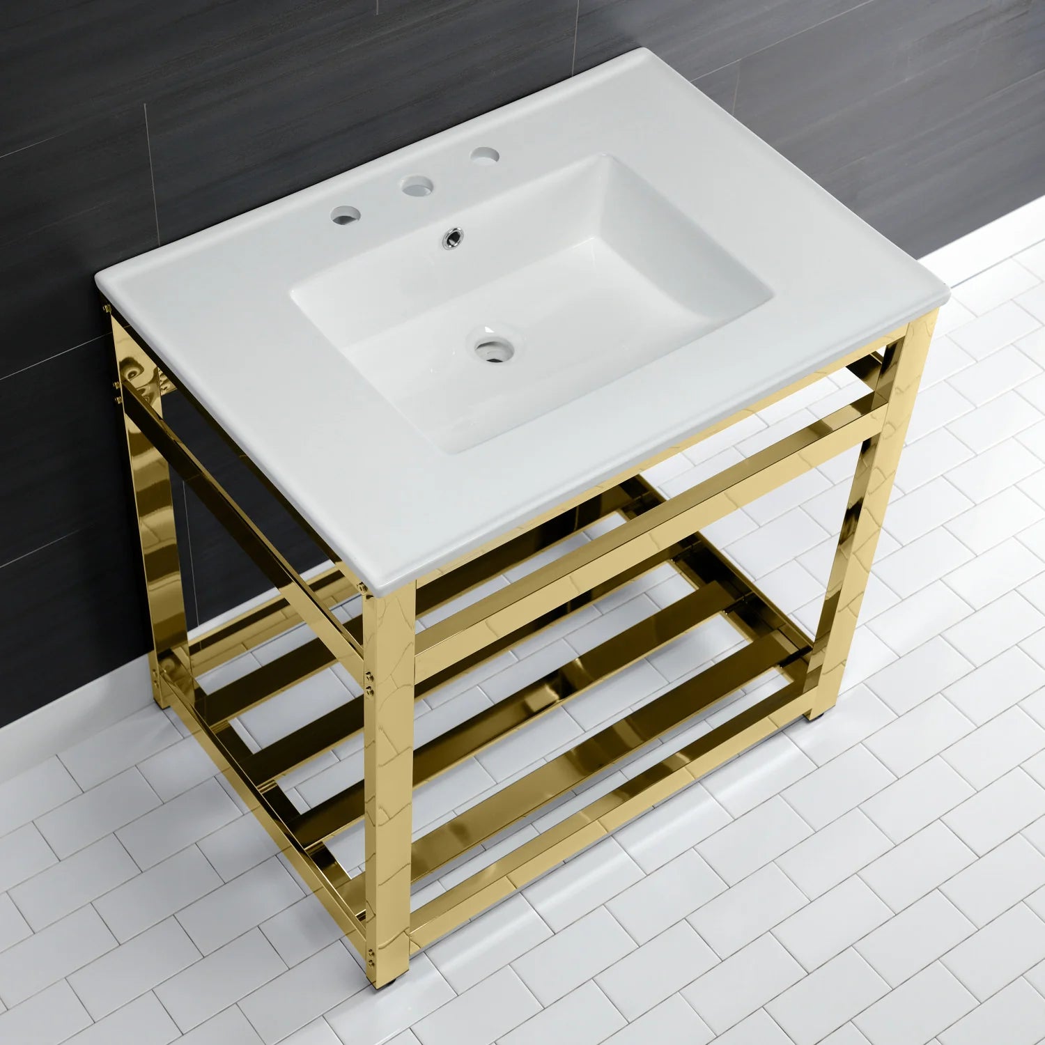 White ceramic sink basin with three faucet openings on polished brass console base