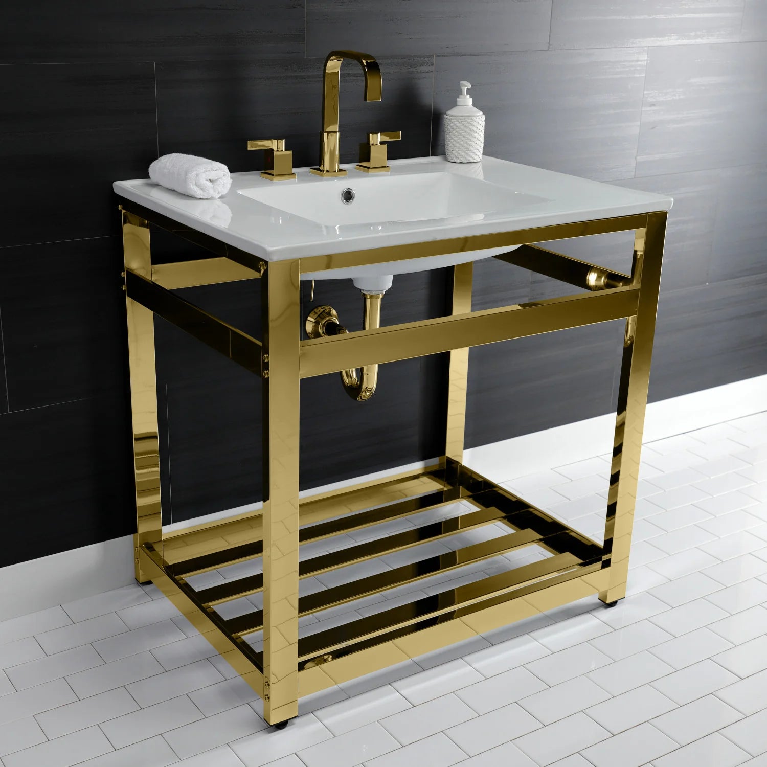 White ceramic console sink with polished brass faucet and open lower shelf on brass frame