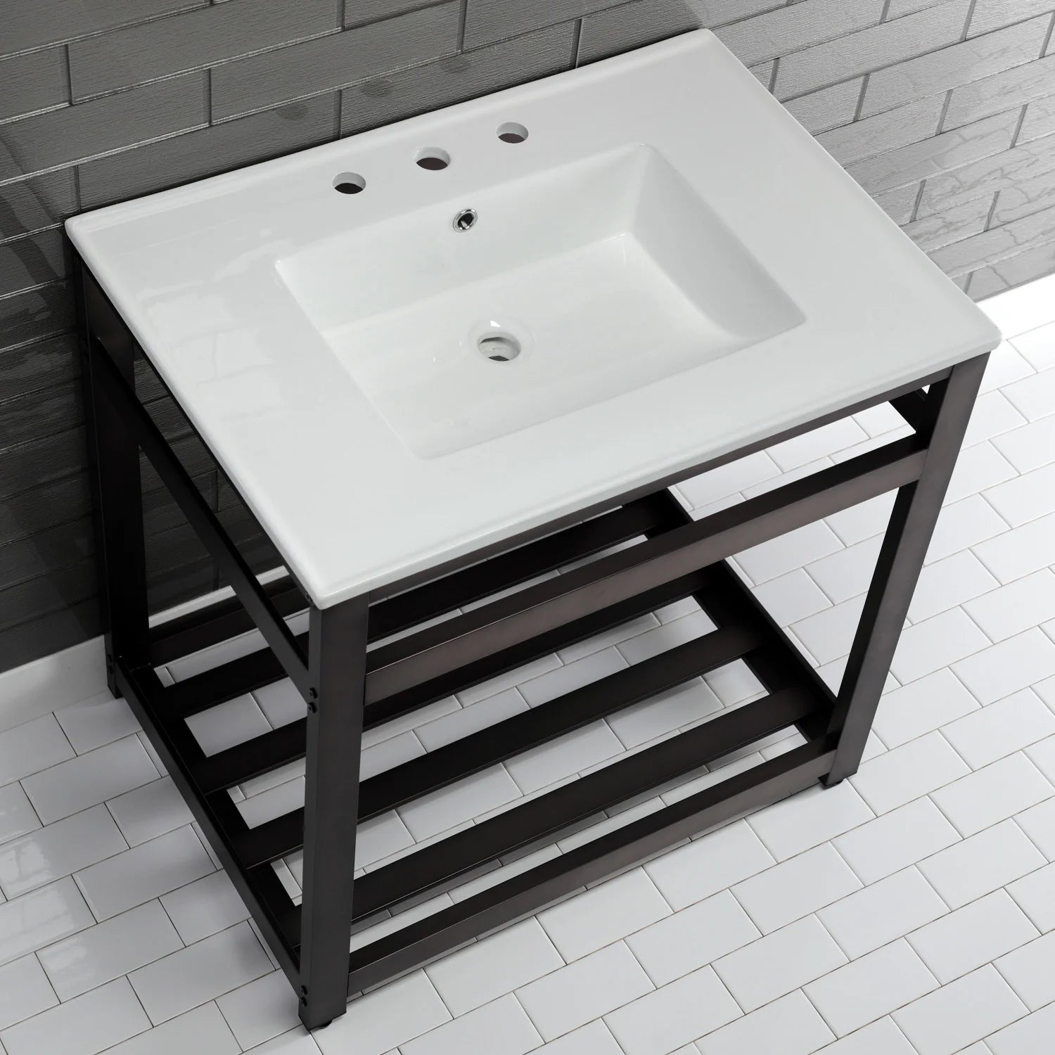 White ceramic console sink basin with three faucet holes and dark bronze base