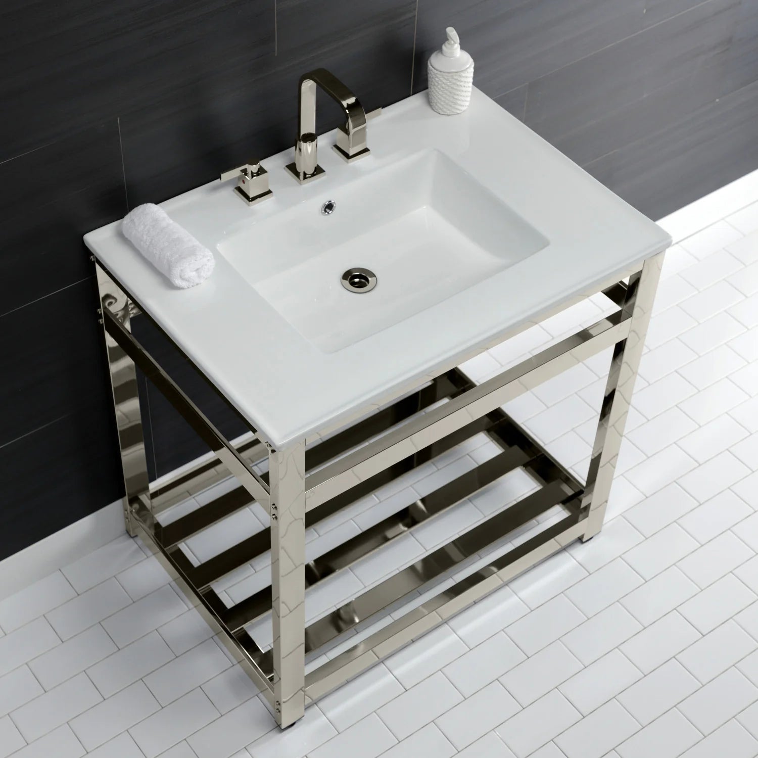 White ceramic console sink with polished nickel faucet set, towel, and open shelf