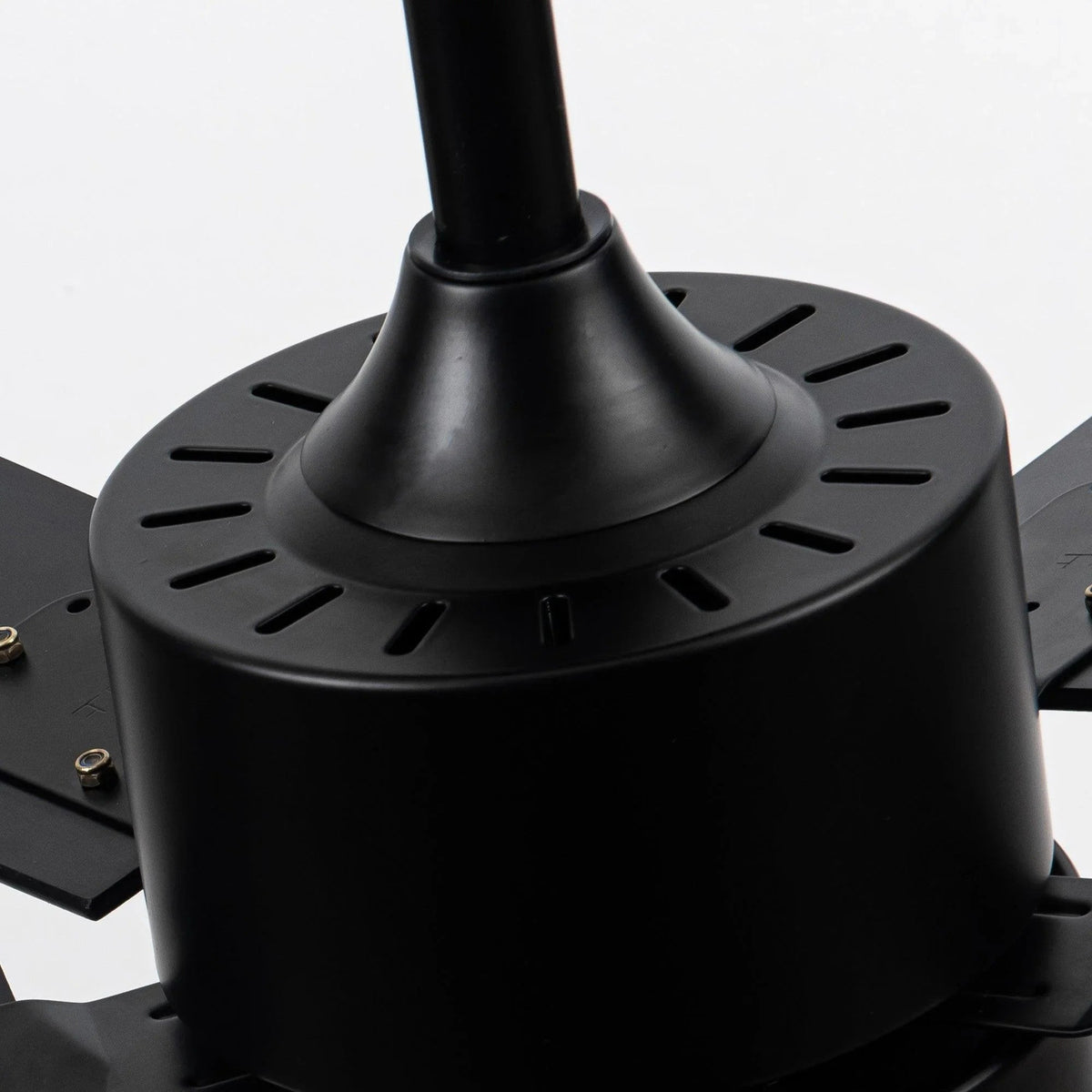 Black ceiling fan motor housing with blade mounting plate detail