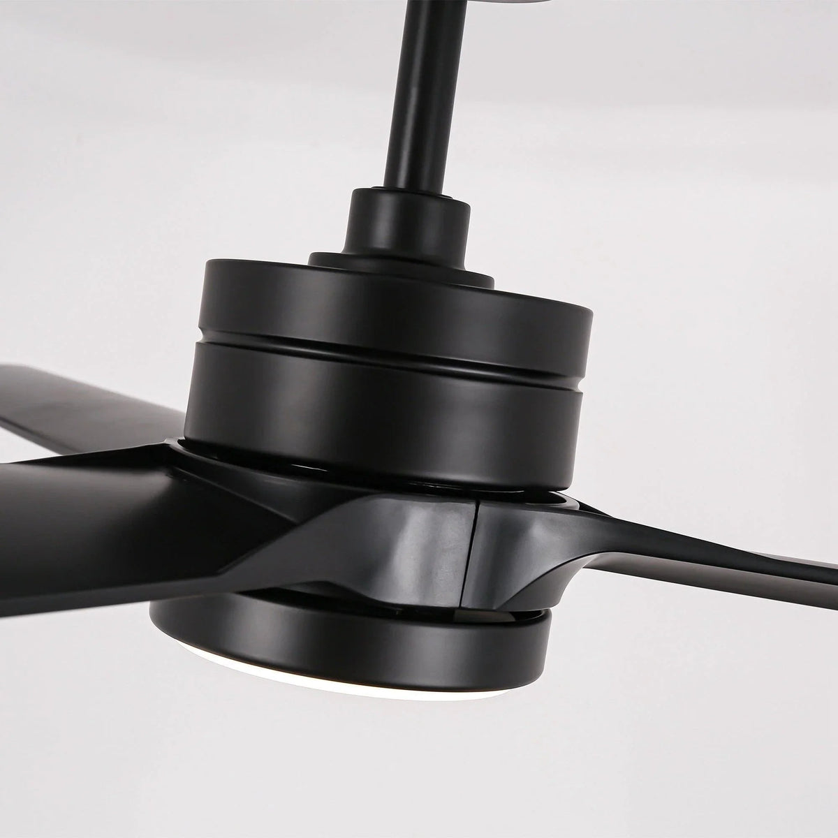 Black ceiling fan motor housing and blade arms with LED light