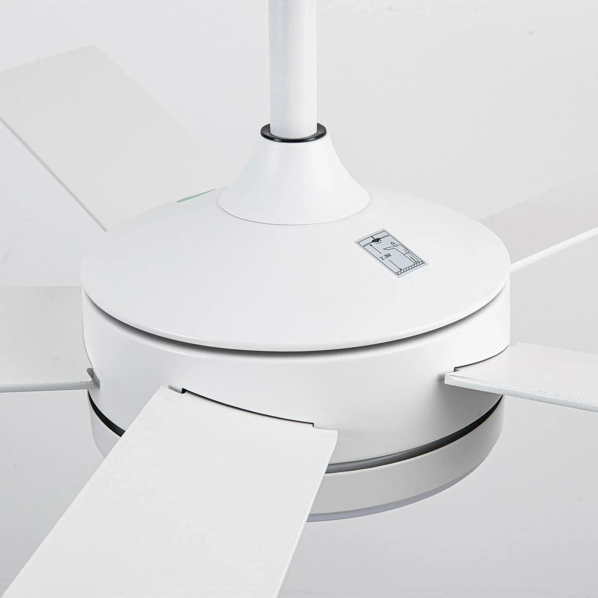 White ceiling fan motor housing with downrod and blade arm