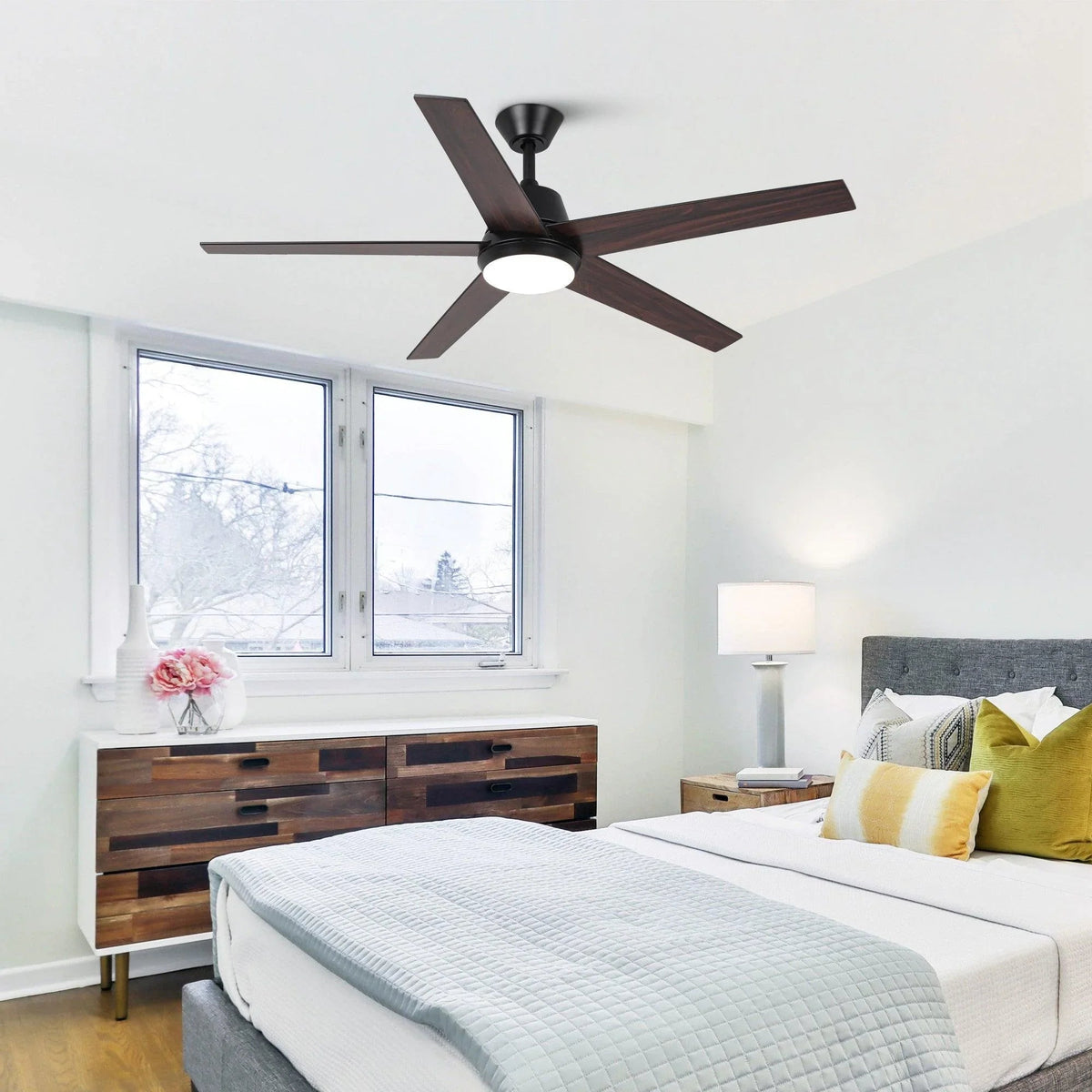Ceiling fan with LED light and five dark woodgrain blades, black housing