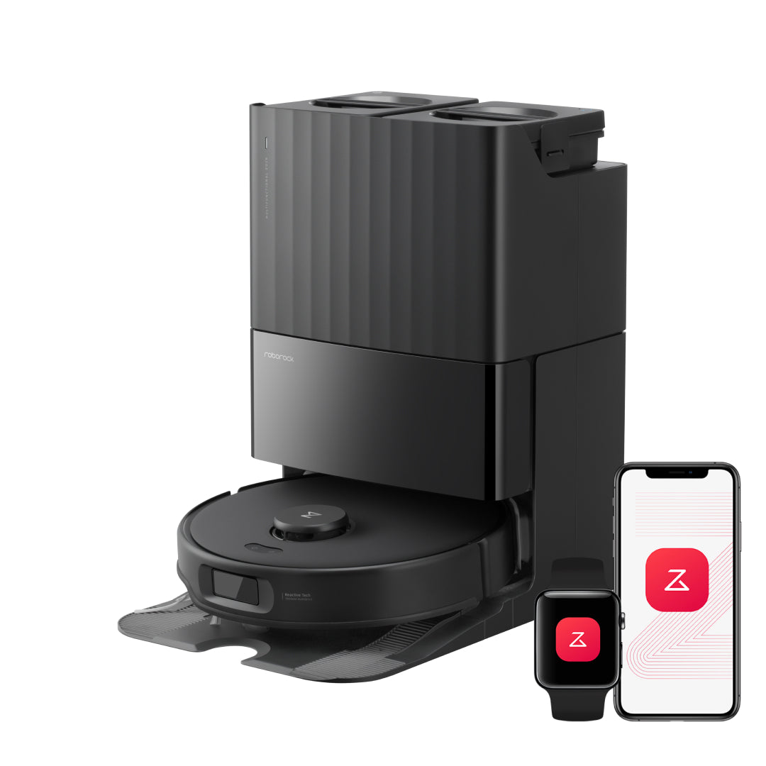 Black robot vacuum docked at multifunctional station with app control on smartphone