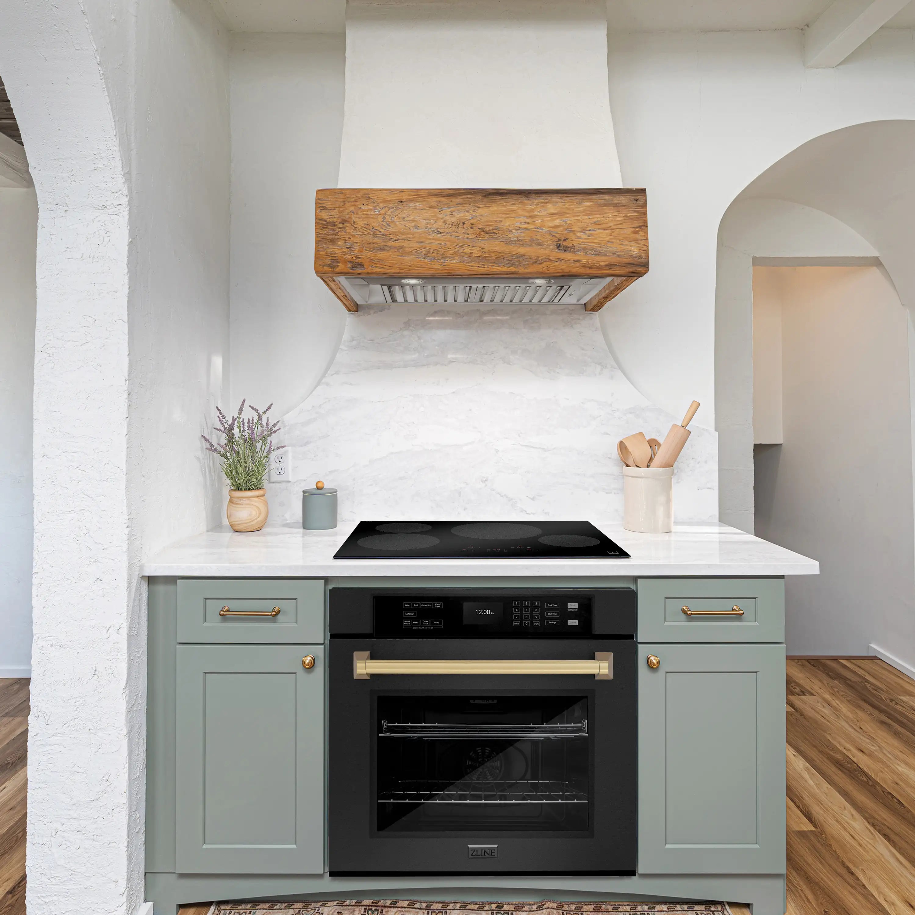 Black stainless single wall oven with champagne bronze handle, open door
