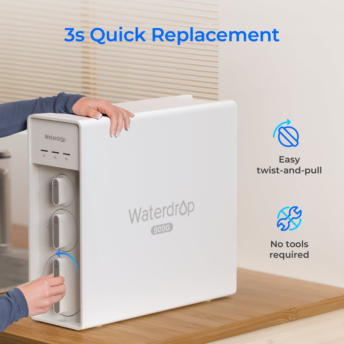 White under-sink reverse osmosis system with twist-and-pull filter access