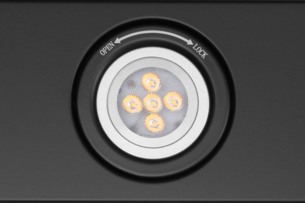 Range hood control area with circular LED cluster and open/lock labels