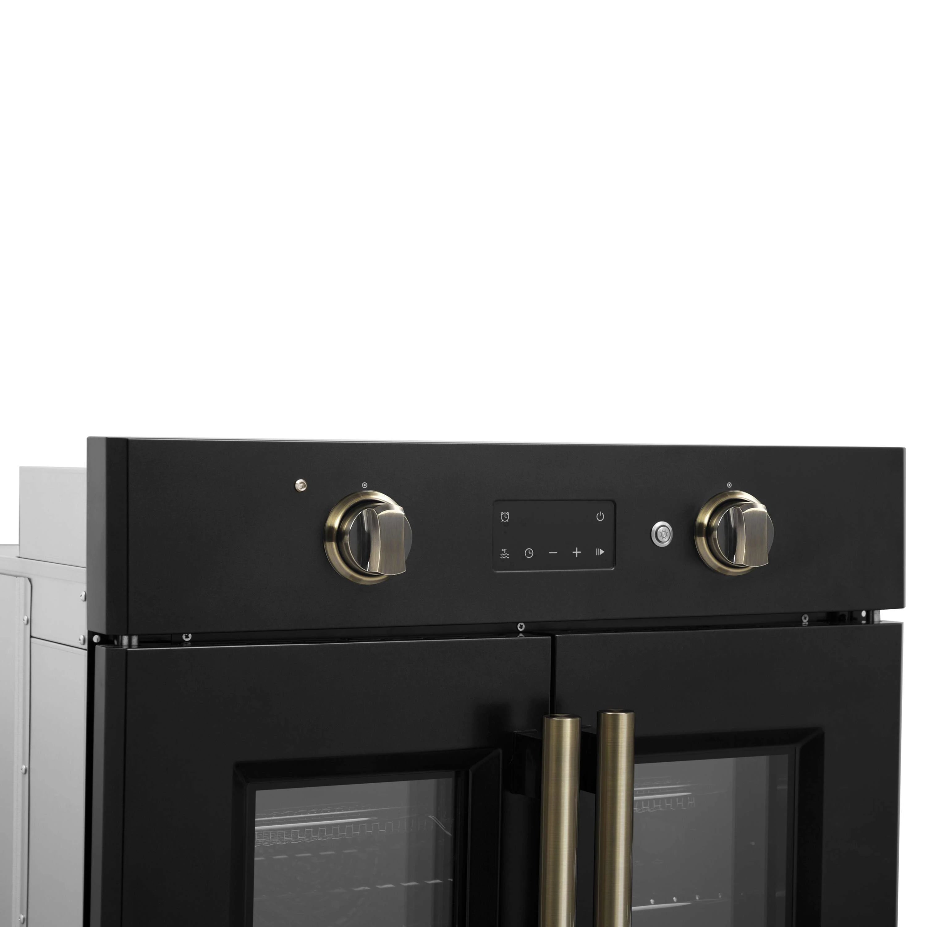 Black electric wall oven top front with brass French-door handles and control panel