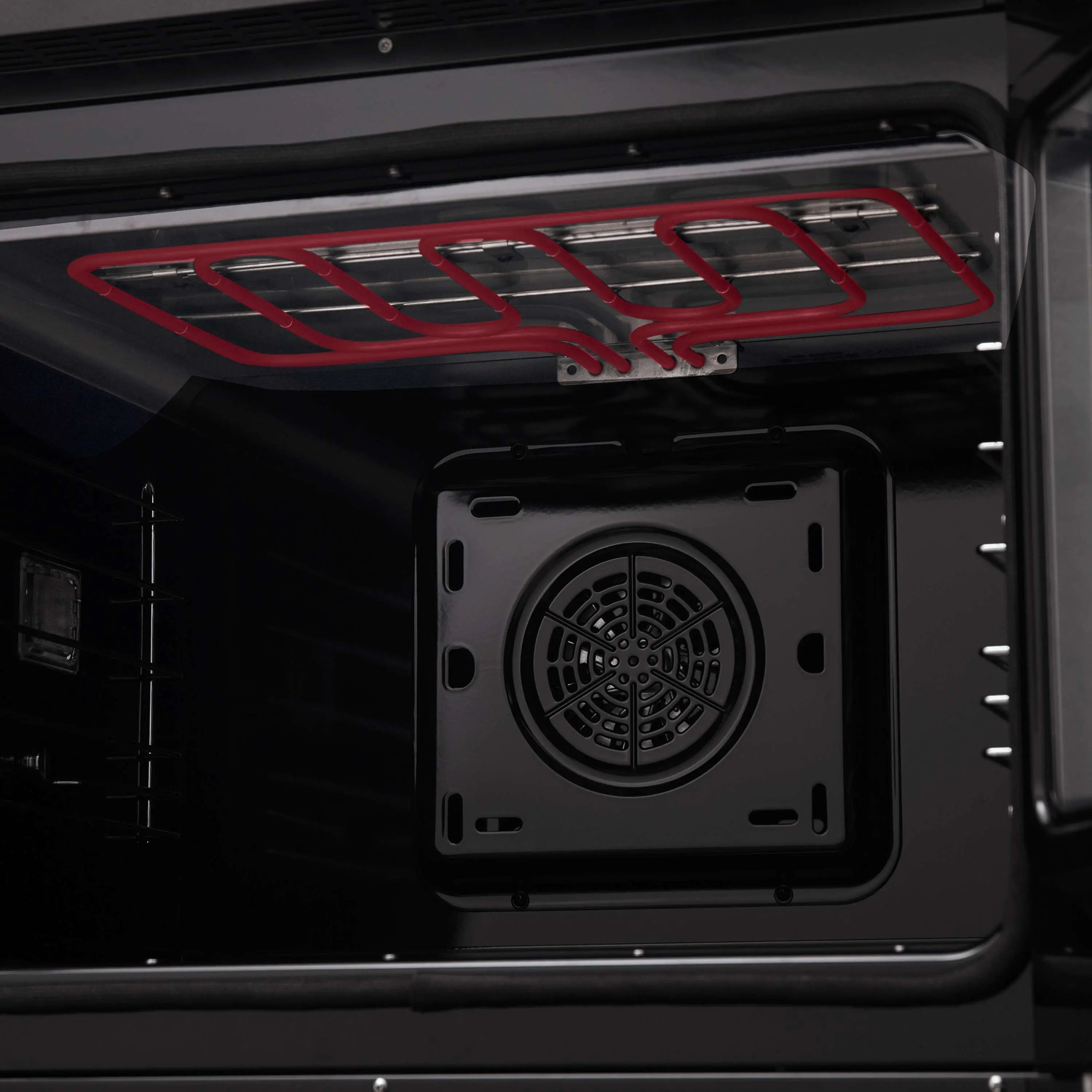 Black oven cavity with circular fan vent and red heating element on back wall