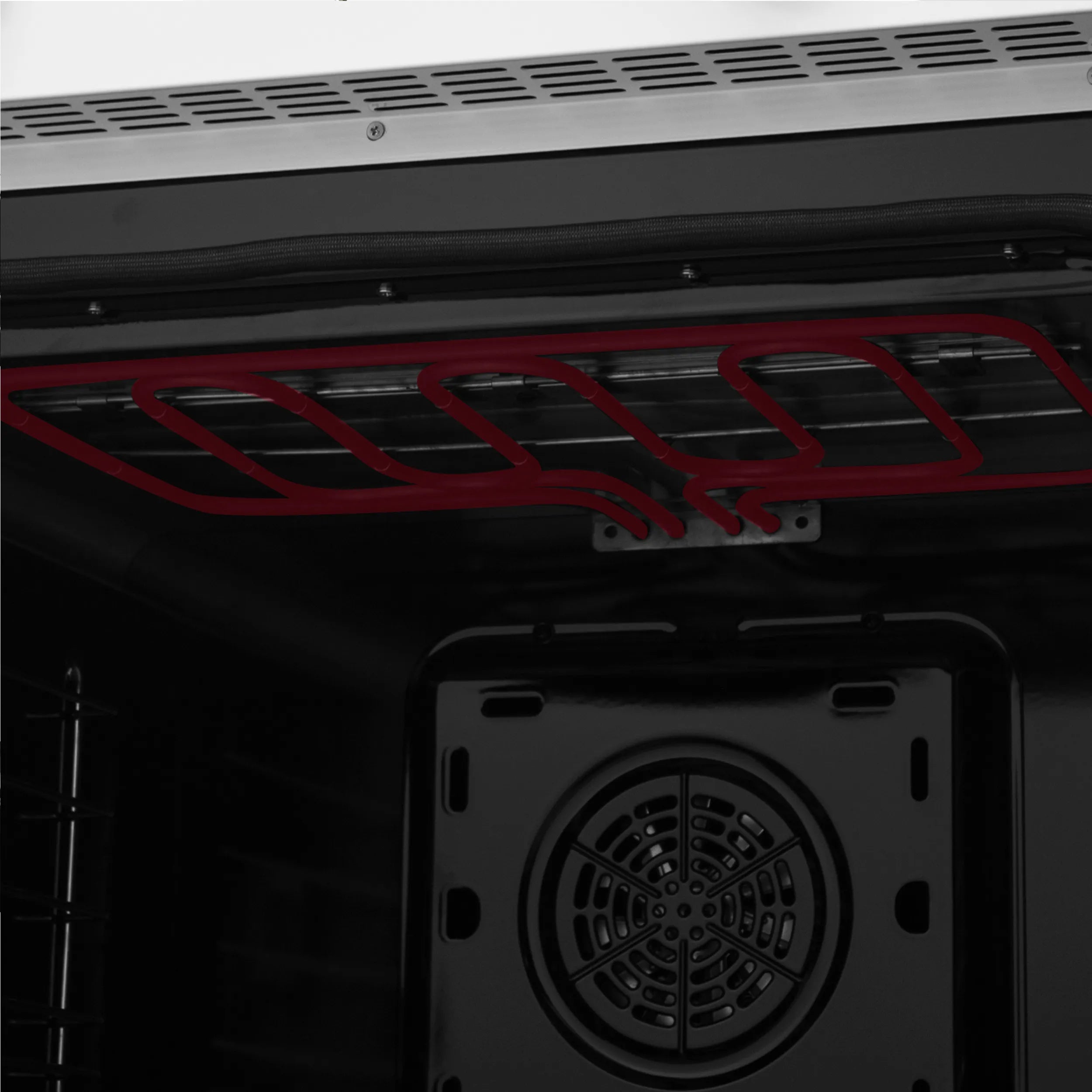Oven interior fan and heating element with red glowing coils on black back panel
