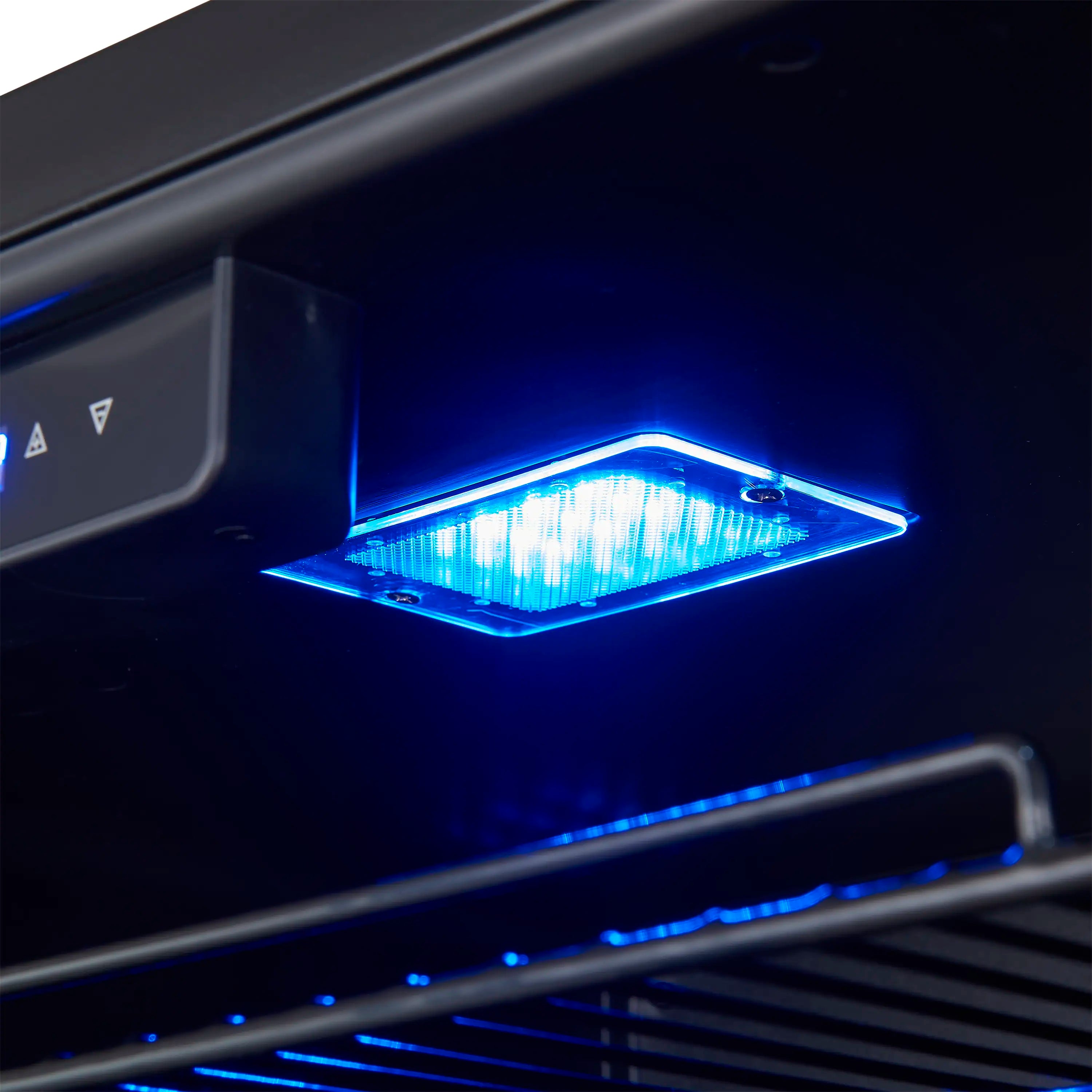 Wine cooler blue LED light near control area with illuminated interior shelf
