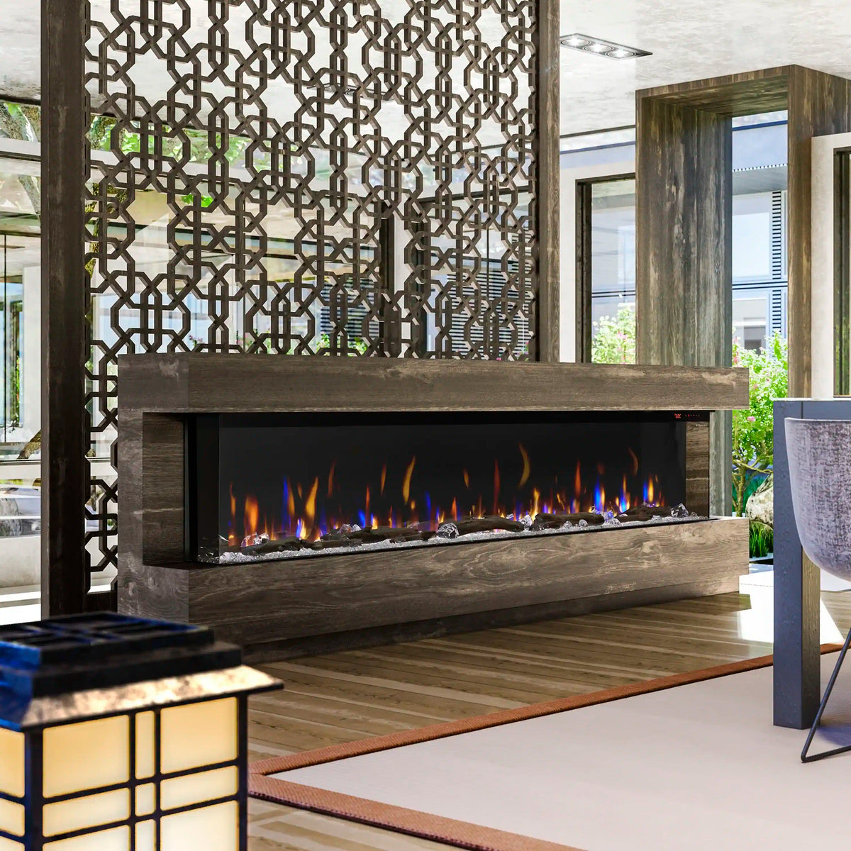 Built-in linear electric fireplace with dark surround and orange flame display