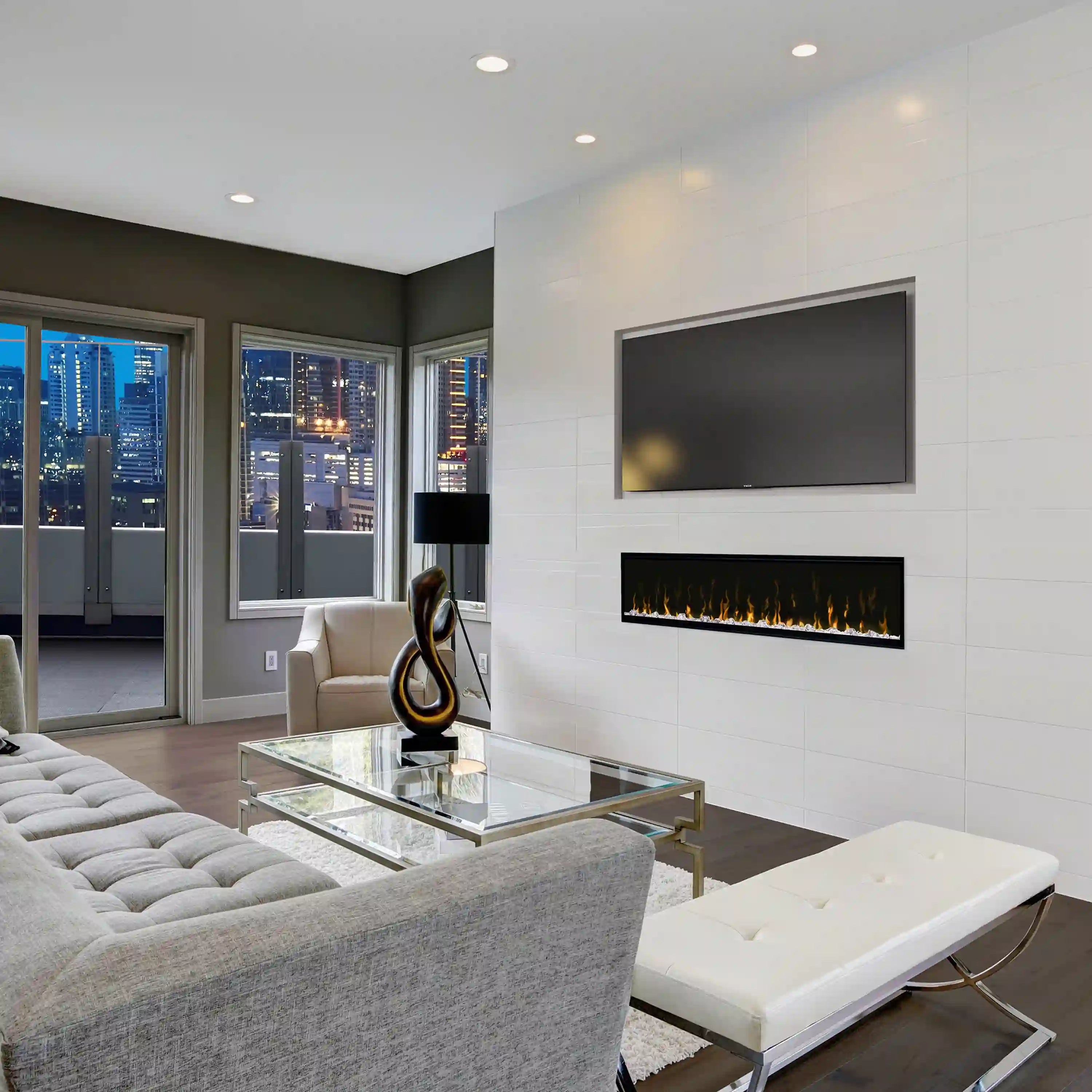 Linear electric fireplace insert with black frame and flame display in wall niche