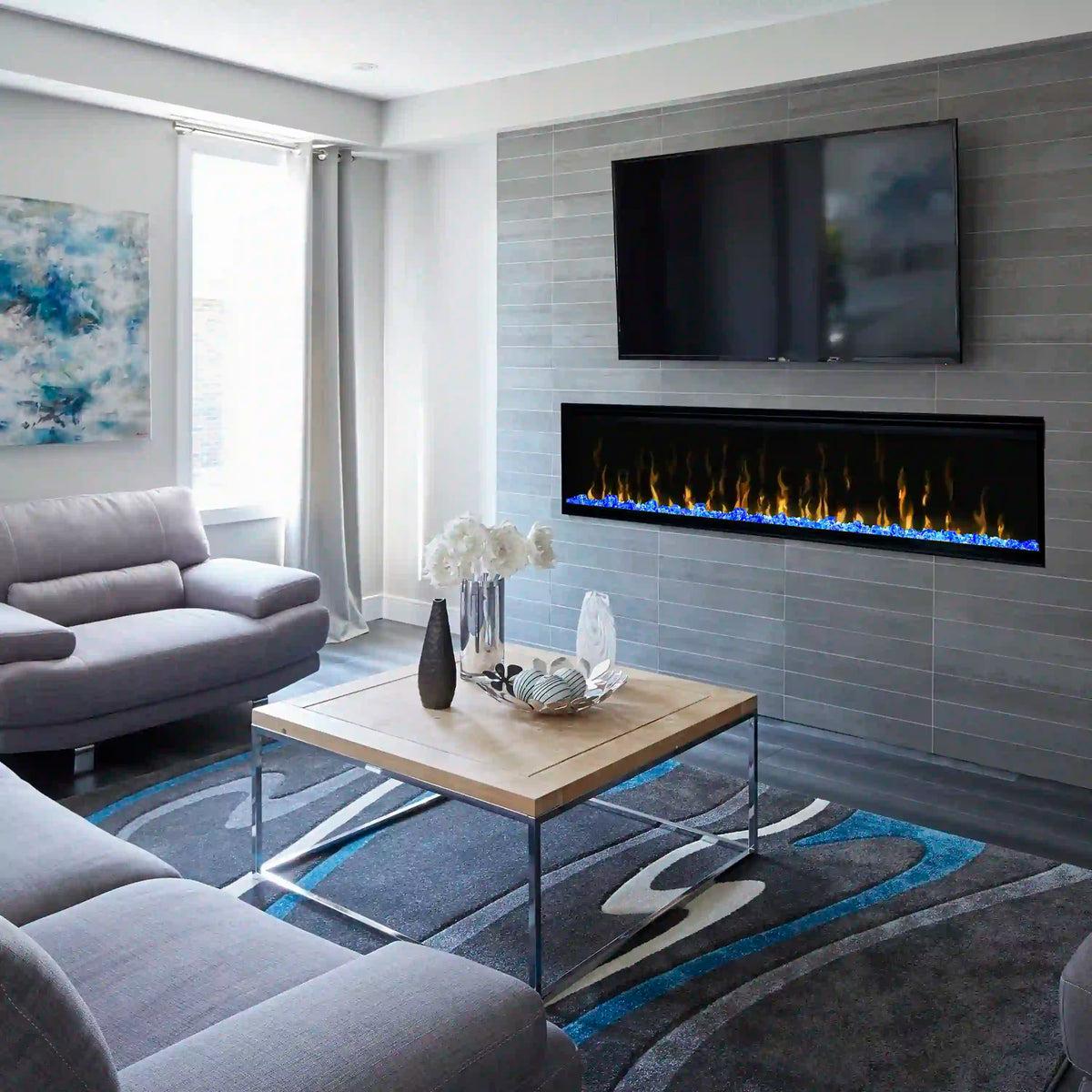 Black-framed built-in linear electric fireplace with flame-effect display