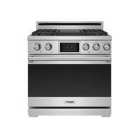 Stainless steel dual fuel range with black oven door and Thor logo on the front