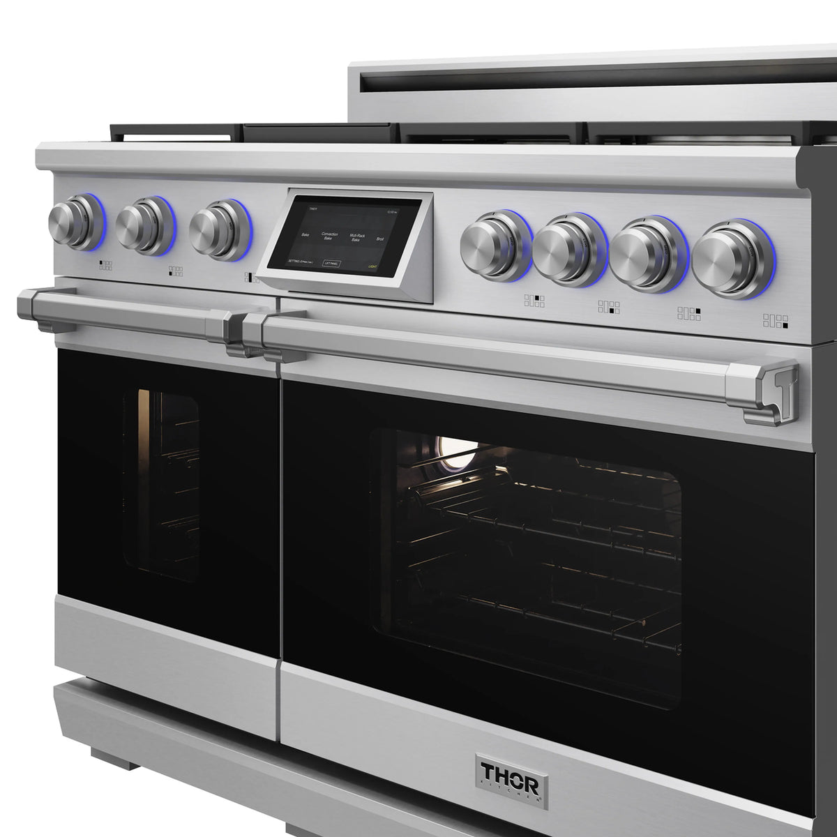 Stainless steel dual fuel range front with digital display, control knobs, oven window
