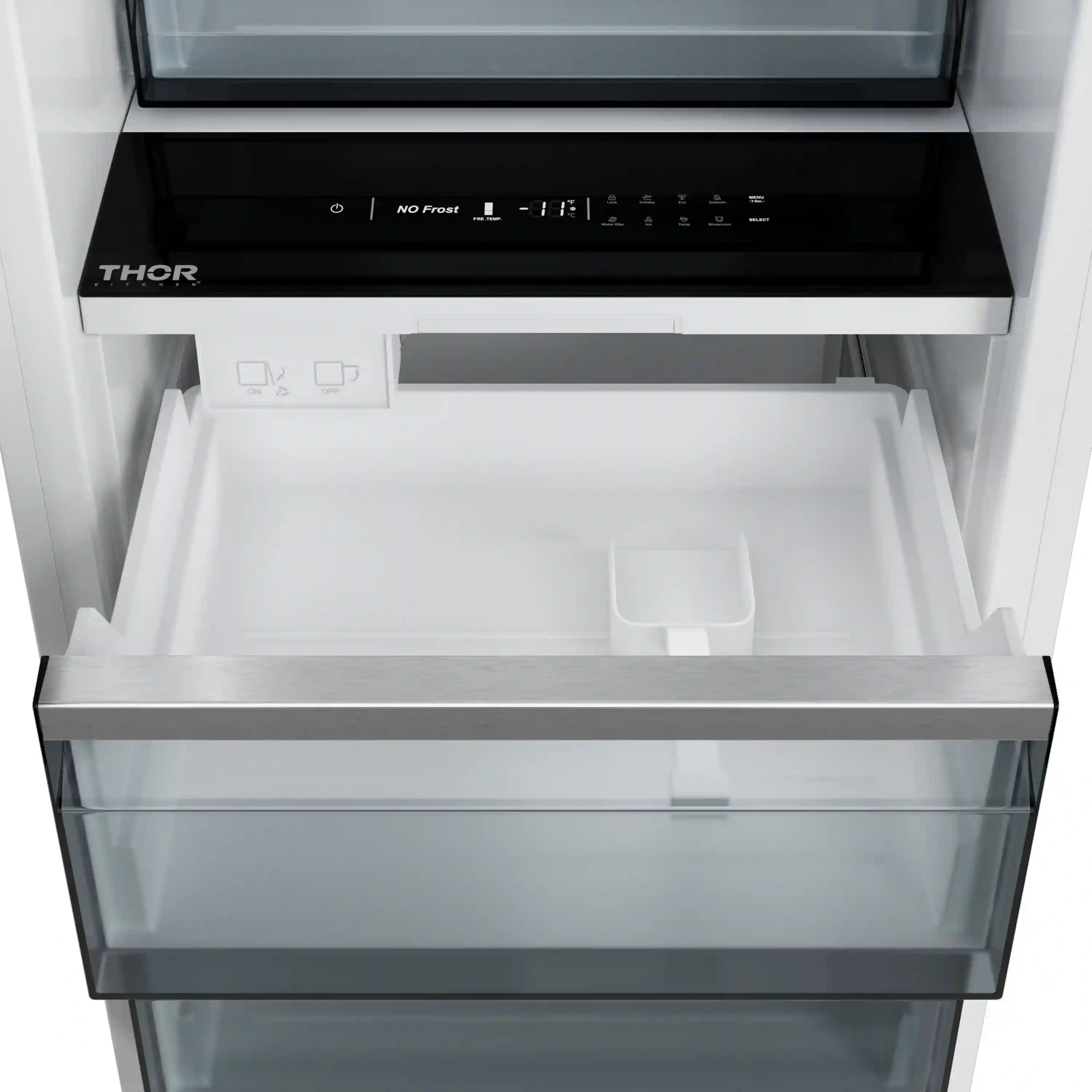 White freezer interior with lower ice bin and clear storage drawer